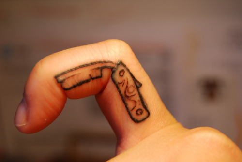 Also a cool finger tattoo