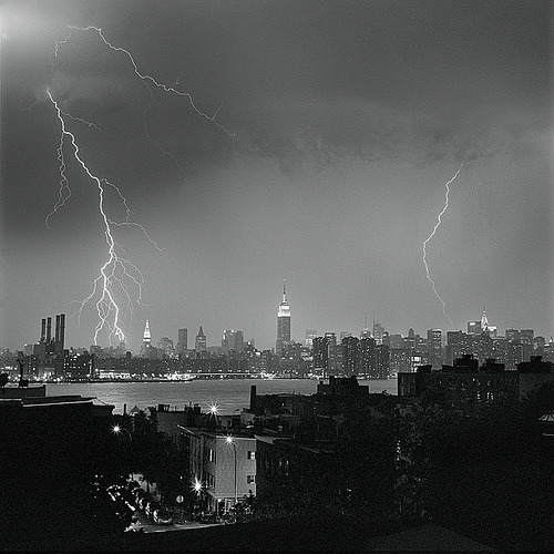 new york city skyline black and white. lightning over NYC skyline