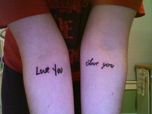 Heart Tattoo and Sun Tattoo. Heart At front Mom And Dad Sun at Back