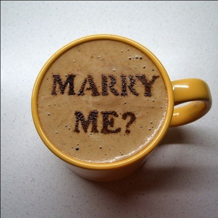  Marry Me edible stencil letters rest on top of a cup of coffee Wow