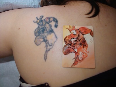 Before: @badcoverversion's jester tattoo and the source art.