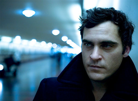 fyeahjoaquinphoenix:  by Michael Muller  44. Joanquin Phoenix (pre-crazy) What can I say… there something about his eyes… and that scar… Gawd… I love this little fucker.