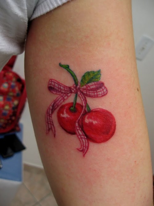 tattoos of cherries. two cherries that means me and
