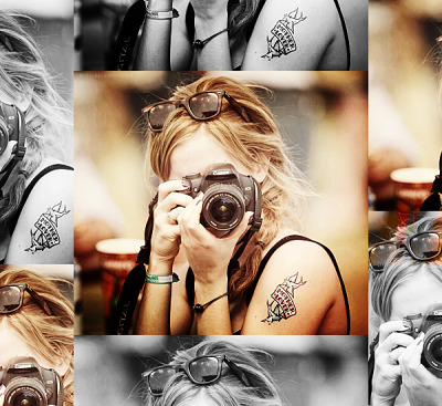 emma watson tattoo. Emma Watson is on her camera.