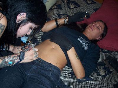 Getting her &#8220;Rock N&#8217; Roll&#8221; tattoo. Getting her “Rock N' 