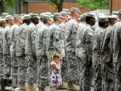 Four-year-old Paige Bennethum really, really didn’t  want her daddy to go to Iraq. So much so, that when Army Reservist Staff Sgt. Brett Bennethum lined  up in formation at his deployment this July, she couldn’t let go. No one had the heart to pull her away.