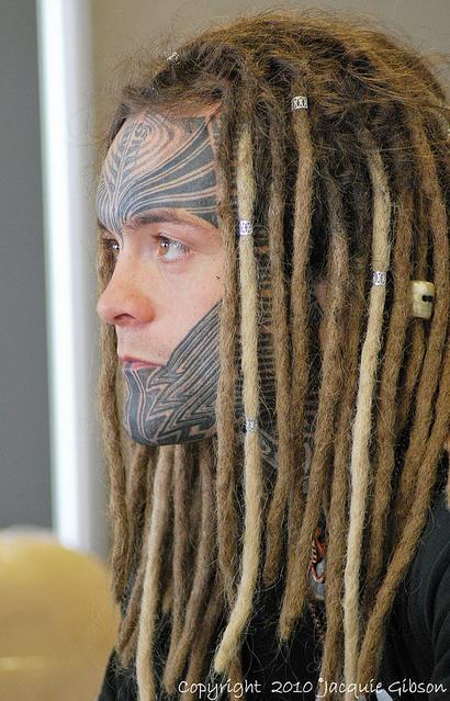 Great facial tattoos and some stellar dreads blackwork face