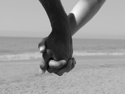 black and white pictures of people holding hands. Holding hands justs expresses
