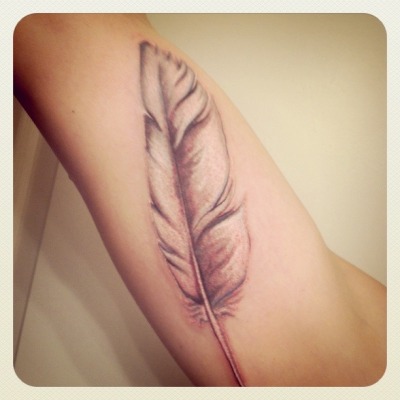 white dove tattoos. A white dove feather.