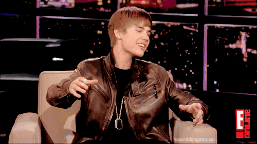 justin bieber laughing gif. Justin Bieber talking about