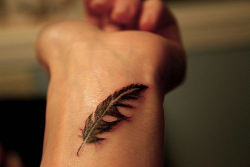 I wish I knew why I love feather bird tattoos so much when the