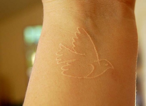 Dove/Bird white ink tattoo