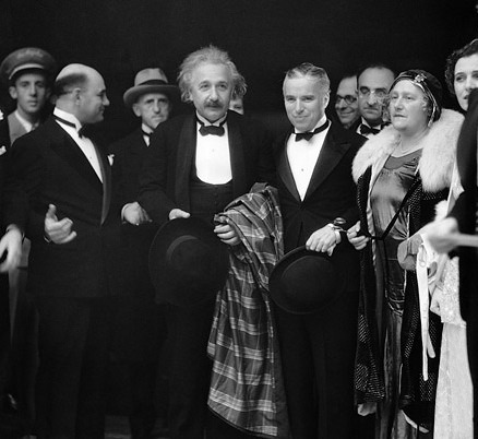 Albert Einstein Charlie Chaplin arrive for the opening of 