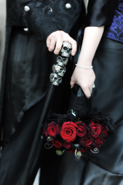 A gothic wedding Love the cane Shrine tail coat and the bouquet