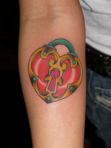 locket tattoos. a heart locket tattoo this