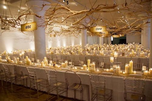 Love the branches love the table numbers love the candles love the mix of