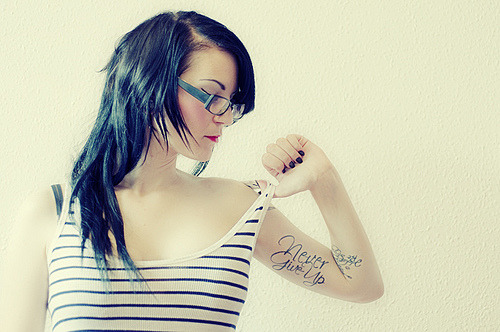 arm quote tattoos