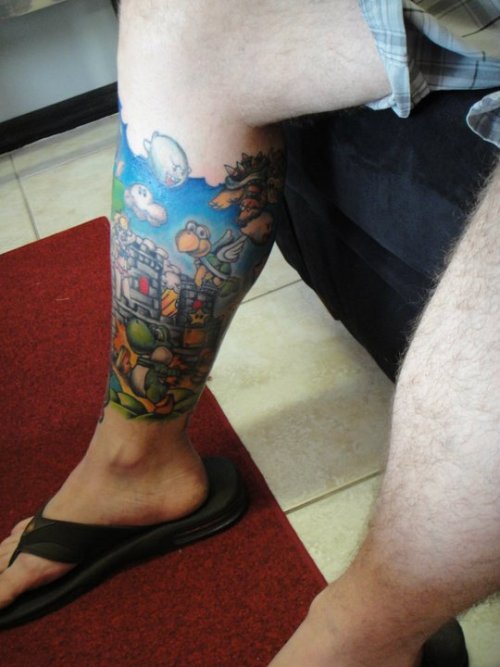 My boyfriend's mario leg sleeve Done by Rebecca Loveless at Epic Tattoo in
