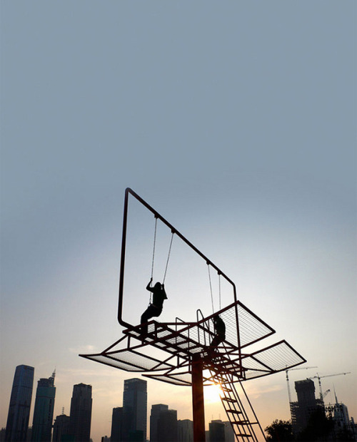 ReCraft Your Billbord: Double Happiness by Architect Didier Faustino
Architect Didier Faustino created this epic swing set out of a converted advertising billboard for the Shenzhen-Hong Kong Bi-City Biennial of Urbanism and Architecture. Double Happiness responds to the society of materialism where individual desires seem to be prevailing over all. This nomad piece of urban furniture allows the reactivation of different public spaces and enables inhabitants to reappropriate fragments of their city. They will both escape and dominate public space through a game of equilibrium and desequilibrium. By playing this “risky” game, and testing their own limits, two persons can experience together a new perception of space and recover an awareness of the physical world—————————————————————————————————Displayed on Recraft |  Follow us on Facebook | Twitter