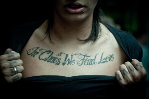 chest piece tattoo text