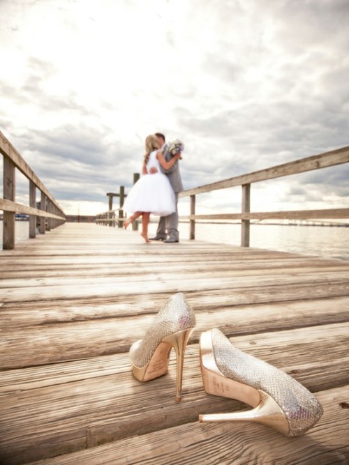 Love this beautiful wedding photo with the couple embracing in soft focus