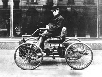 Henry Ford in his first car the Quadricycle built in 1896