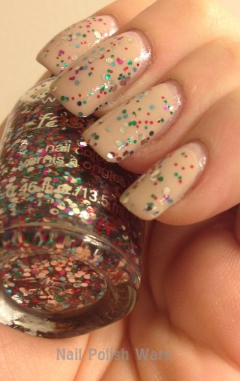 nailpolishwars:

Holiday Sugar Cookie Mani


For how to:
http://nailpolishwars.blogspot.com/


Multi-color glitter on nude polish might be my new favorite mani&#8212;I&#8217;m thinking it&#8217;ll be the perfect manicure to wear to ring in the new year!