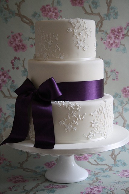 I LOOOOOVE the bow and the deep purple purple wedding cake wedding bride 