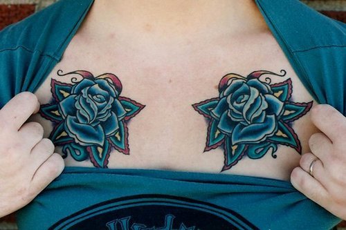 Tagged as tattoos tattoo ink chest tattoo chest piece flower tattoos