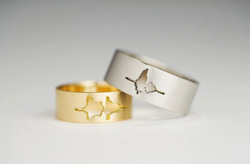 Wedding rings with the sound waveform of the couple's voices saying I do