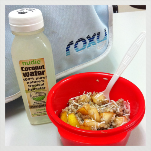 Yummy lunch at work! Buckwheat with coconut and pear and some refreshing coconut water! :) feeling a bit tropical!
