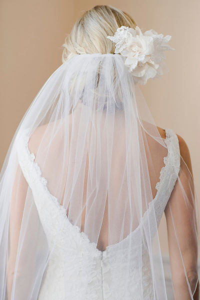 blonde in lace wedding dress