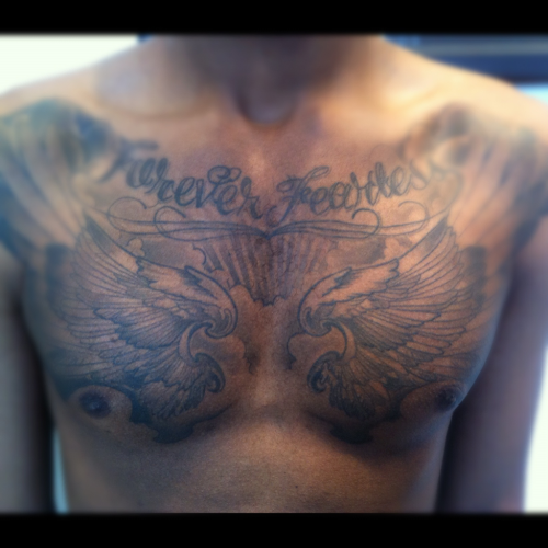 tattoo lettering on chest