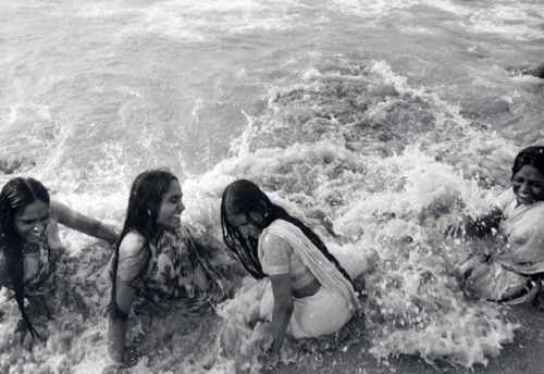 beautiful indian girls enjoying the water