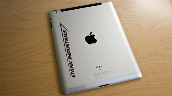 An Avengers logo decal for my laptop and a Stark Industries logo decal for 