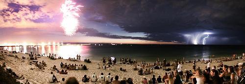 shaaaronn: -courtneeey: This was taken in Australia. Three separate things happening at once: On the left, fireworks exploded as part of Australia Day celebrations. In the middle, it’s Comet McNaught. Then on the right, there’s lightning from a thunderstorm far away. woah, seriously? 