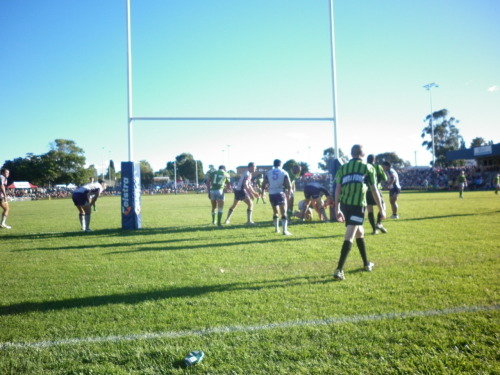 The Raiders played in Bega yesterday. I was glad to get to the very first Raiders match of the season, and glad to see some league action in Bega.  Unfortunately the Green Machine went down in both grades. There were a lot of players out, and it definitely wasn’t a “real game” (eg 3 thirds of 30 mins). Each team used about 30 players, some of which didn’t even have a number. The Raiders had two number 19s in the 20s, and Daniel Vidot and Hayden Hodge both wore number 5 in first grade.  Looking forward to the real season kicking off, in just a few weeks.  This picture is from a Raiders try, during the under 20s. Pretty sure this was the one when McIlwrick came on the field and scored a try immediately. Too bad the Storm had already put 28 points on them. It was 34-16 in the under 20s, 24-4 in the big match. My mum said the Raiders played like girls and dropped the ball too much. My Dad said the girls sitting behind us were not a good example of the young ladies of Bega. Too polish off a weekend of loser-ing, I played indoor soccer, we were reasonably in the game at 2-1 down, but our last quarter was a disaster, and we lost 5-1.